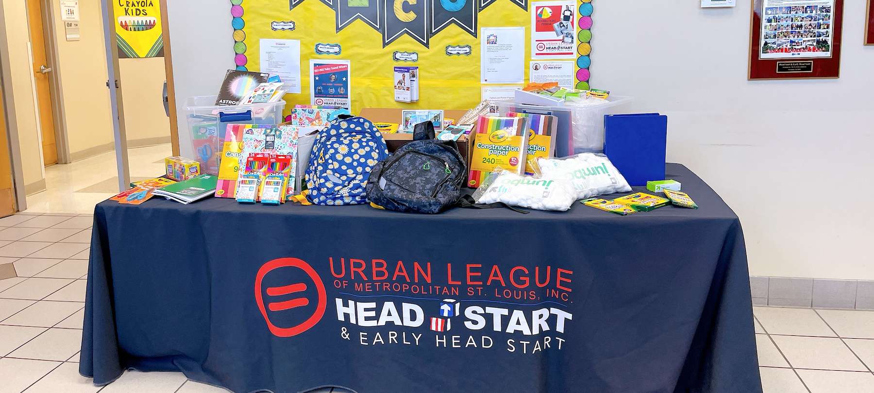 Table full of donations for Urban League head start programs